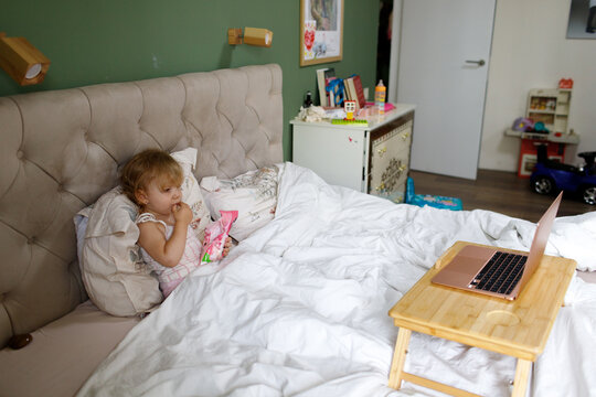 child watching cartoons on a tablet