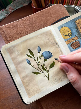 Painting a blue flower