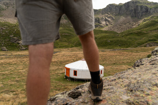 Hiker approaching yurt