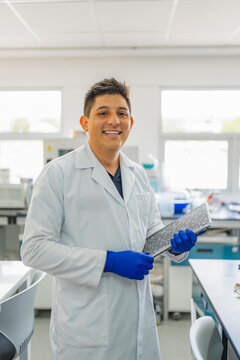 Young scientist with notebook