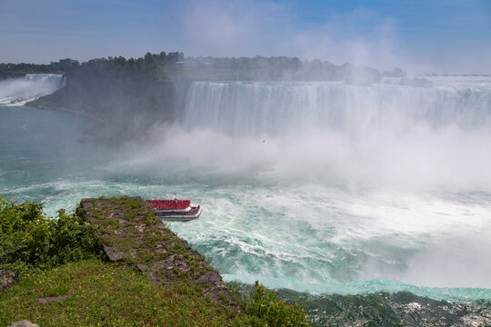Tour Boat Floating Into the Mist of Niagara Falls, Ontario, Canada
