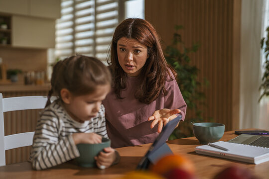 Mother scolding child for misbehavior in a domestic argument