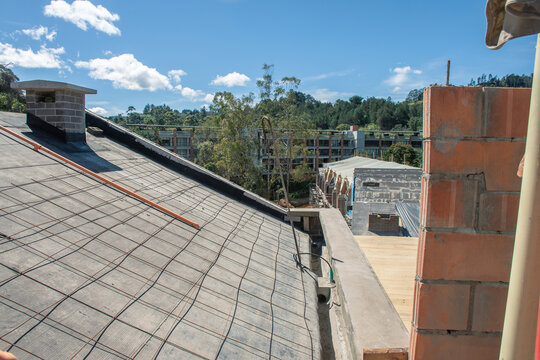 Construction view from rooftop showing ongoing building progress