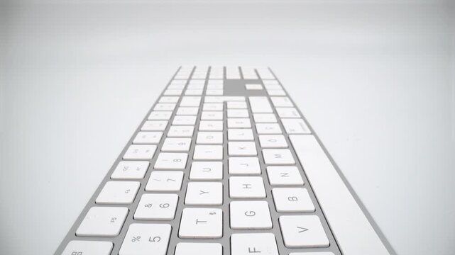 Macro of keys of wireless keyboard on white background isolated
