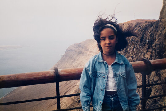 Analog film portrait of girl looking at camera