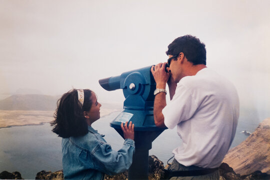 Analog film of father and daughter on summer vacation