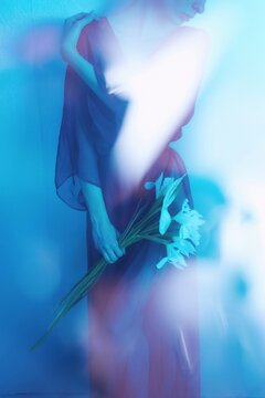 Blue Light Woman Portrait With White Flowers