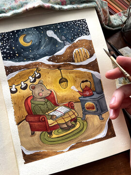 Contemplating an illustration of a bear