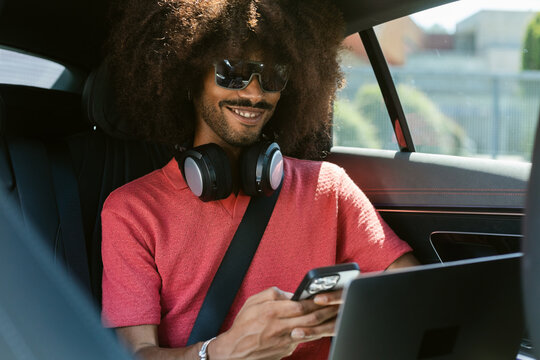 Tech Backseat Car Man