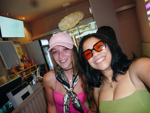 Friends Smiling in a Bright Caf&Atilde;&copy;