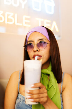 Woman Drinking Bubble Tea Seated
