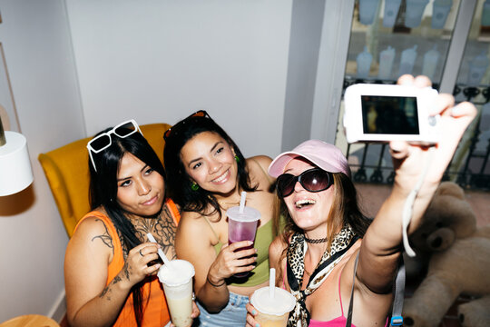 Friends Taking Selfie with Drinks