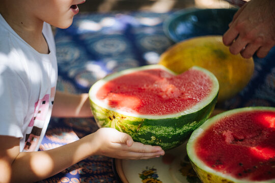 Outdoor summer snack time with watermelon