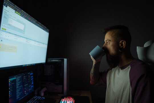 Hipster freelancer focused on night work