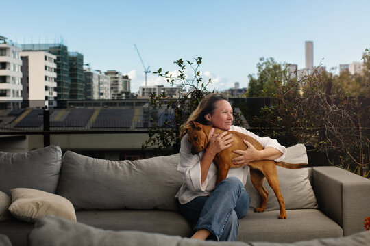 mature woman with puppy