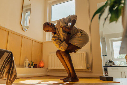 Chair Pose with Hands Together