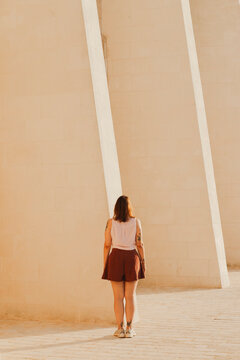 Girl against an architectural background