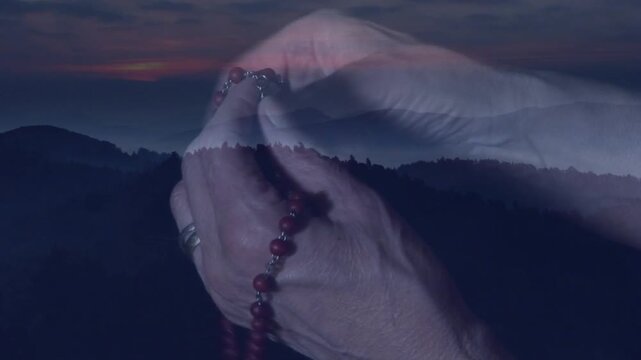 Dusk glow starting motion with senior hands threading, sliding rosary beads for quiet prayer