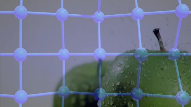 Blue-violet grid activating, shifting and revealing green apple droplets and stem, showing texture