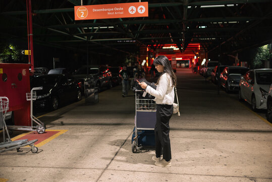 Woman waiting at airport