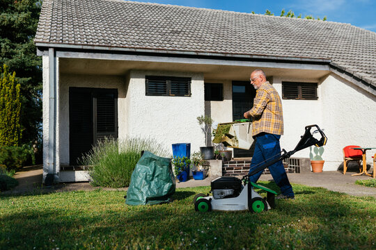 Senior Man Lawn Mowing