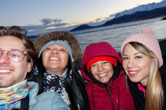 UGC Friends Enjoying a Winter Beach Outing in a Coastal Location
