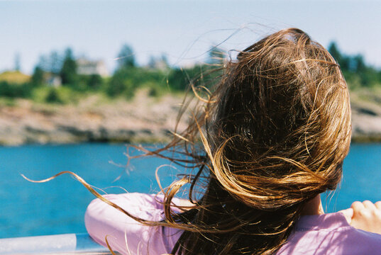 Child's hair blows in the wind