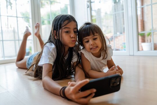 sisters taking a selfie 