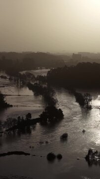 Vertical shot of flooded farming fields in a river on the North of Portugal