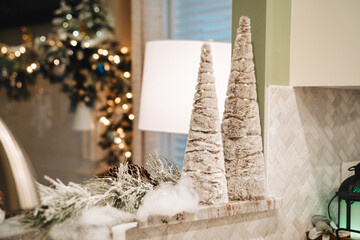 Modern faux fur Christmas tree decorations on marble countertop