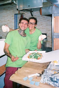 Pizza Makers cooking in italian restaurant