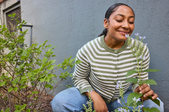 Woman gardening in the backyard