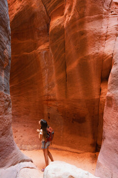 Girl in red rock canyon