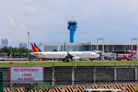 Manila, Philippines - 2025 July 13: A Philippine Airlines Airbus A321 aircraft (registration RP-C9924) taxis at Ninoy Aquino International Airport.