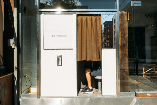 Person in New York City Photo Booth Summer Travel