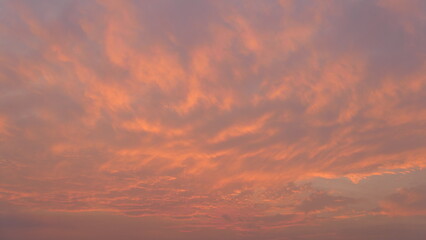 Obraz premium Warm Orange Sunset Clouds Over Jaipur Sky in February