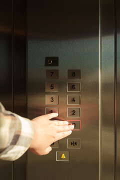 Pushing button in lift