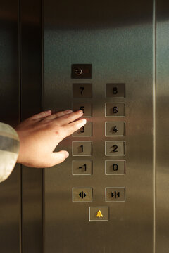 Pushing button in lift