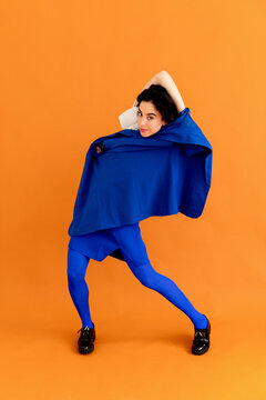Woman posing with blue blazer