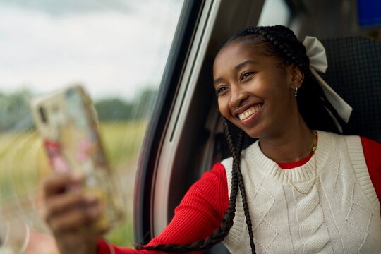 Capturing Joyful Moments on a Scenic Train Journey Through Nature