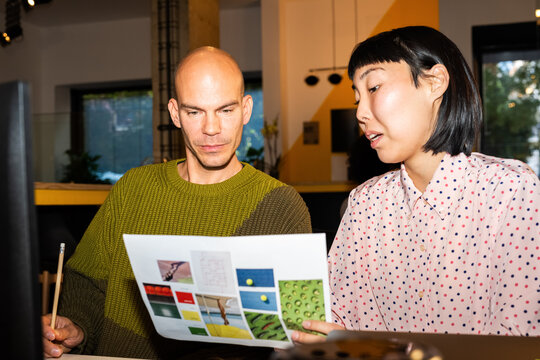 Two Professionals Working in a Modern Workspace