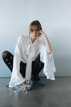 Gorgeous woman portrait over studio background