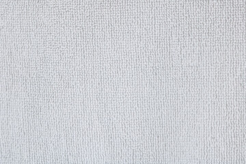 Fototapeta premium A closeup view of terry cloth, a fabric renowned for its high absorbency and soft, tactile surface. Used for high-quality bath towels, robes, and spa accessories.