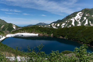 Mikurigaike, a picturesque volcanic pond at an elevation of 2,450 meters in Japan