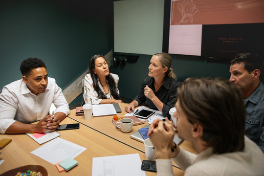 Team members brainstorming ideas during a collaborative meeting