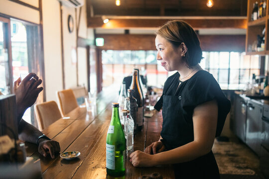 A bartender in a Japanese restaurant