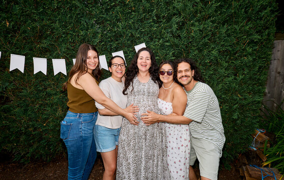 Group of cousins posing together at family gathering