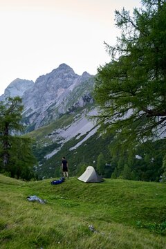 Camping in the Mountains at Sunset With a Tent Set Up