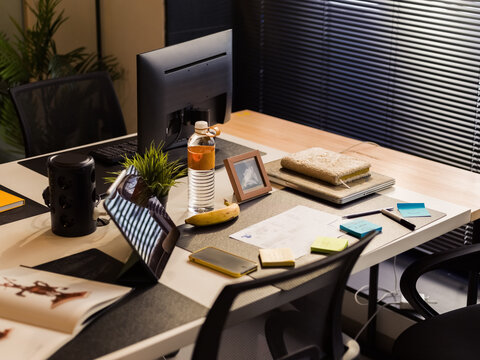 Modern Office Desk Setup With Personal Items and Workspace Essentials
