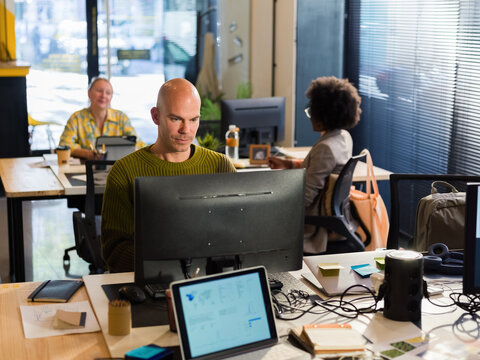 Focused Workers in a Modern Office Environment During the Day